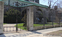 metal-fence-and-gates-with-concrete-columns