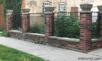 brick-decorative-columns-metal-fence