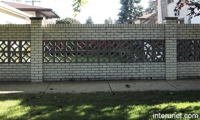 Brick fence with decorative concrete blocks picture | interunet