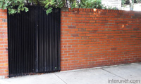 brick-fence-with-metal-element