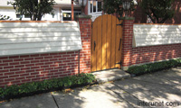 brick-vinyl-siding-fence