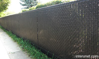 chain-link-fence-brown-privacy-slats