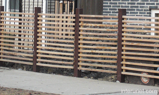 horizontal-wood-fence-with-steel-posts