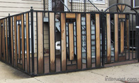 metal-fence-with-wood-sections