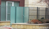 steel-fence-with-glass-gates