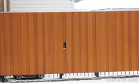 wood-fence-with-gates-stained