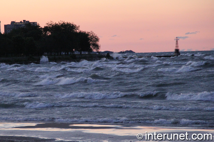 big waves on Lake Michigan during sunset