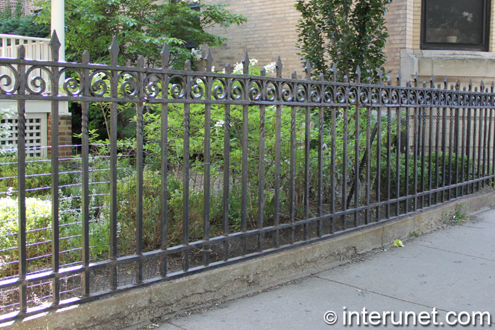 steel-fence-on-concrete-foundation