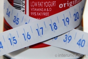 yogurt with tape measure low-fat-yogurt-wrapped-with-tape-measure