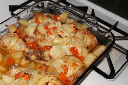 Chicken legs with potato baked in the oven 