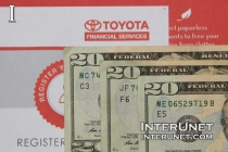car-loan-billing-statement-and-$20-bills