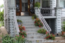 concrete-porch-with-stylish-railing