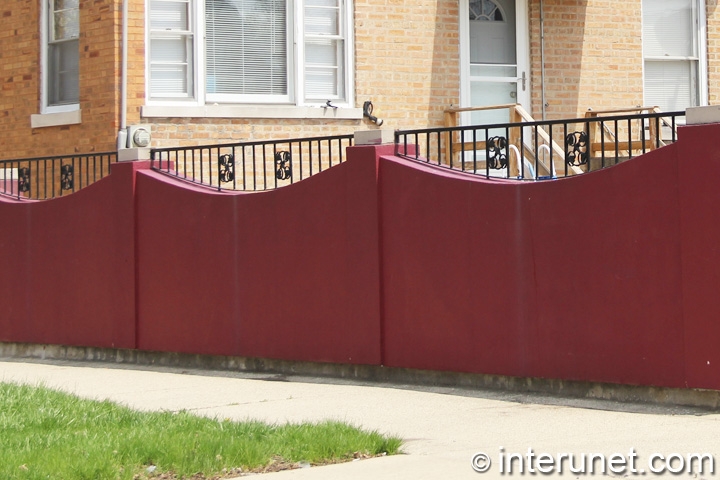 concrete-fence-painted-red