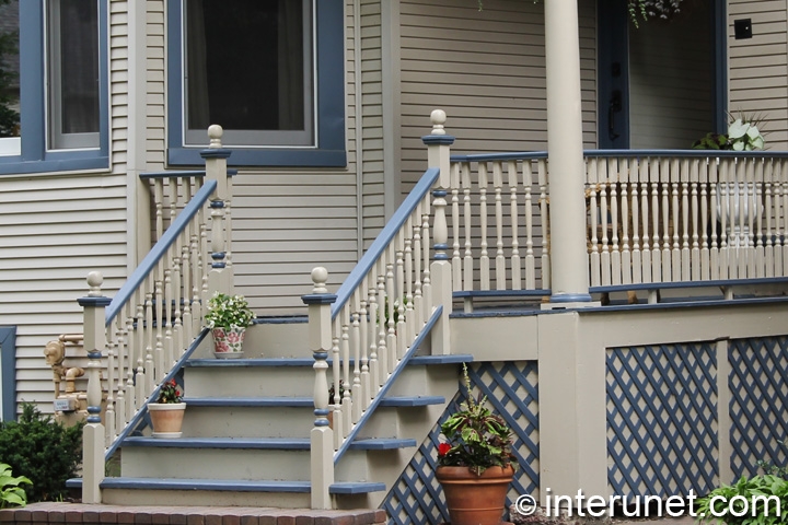nice-front-porch-decorated-with-flowers-in-pots