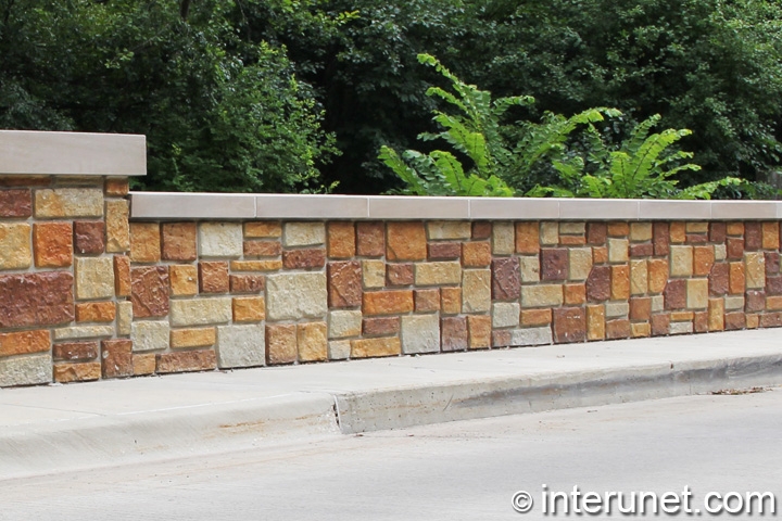 stylish-stone-fence-with-concrete-sills 