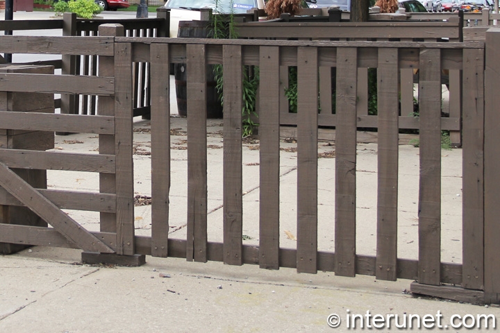 wood-fence-with-horizontal-and-vertical-boards