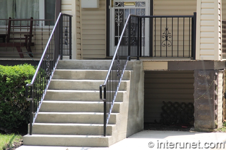 wood-porch-concrete-steps-steel-railing-combination
