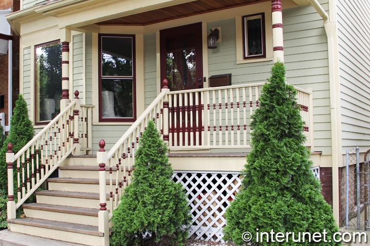 wood-porch-with-stylish-railing