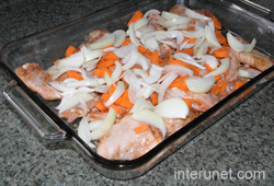 adding-onions-and-carrots-into-baking-tray