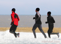 men-running-near-lake