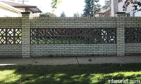  brick-fence-with-decorative-concrete-blocks 