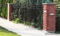 brick-posts-metal-fence