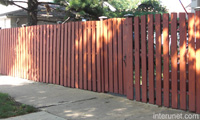 painted-red-wood-fence-semi-privacy